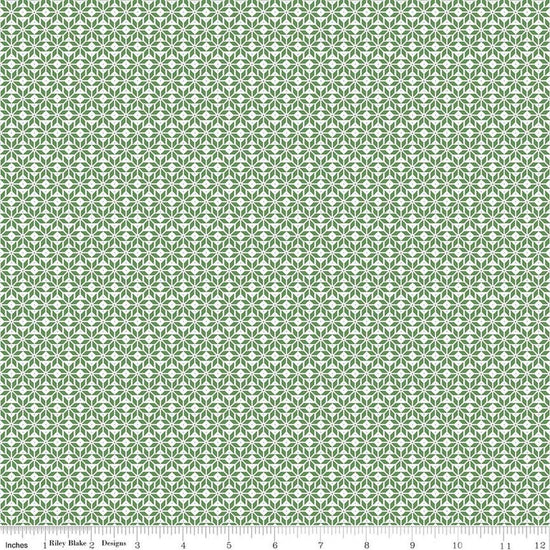 Image of Claus & Co. Star Pattern Green quilting cotton fabric by Melissa Mortenson for Riley Blake Designs. Features stars on a green background. Cute Little Fabric Shop.
