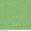 Image of Claus & Co. Candy Cane Toss Green quilting cotton fabric by Melissa Mortenson for Riley Blake Designs. Features candy canes on a green background. Cute Little Fabric Shop.