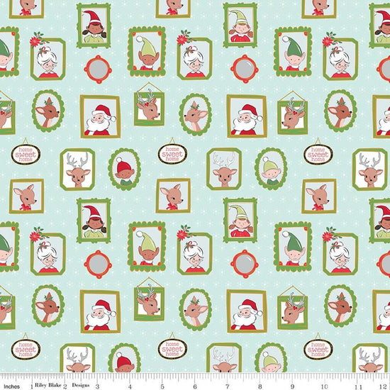 Image of Claus & Co. Wallpaper Blue Sparkle quilting cotton fabric by Melissa Mortenson for Riley Blake Designs. Features pictures on a blue background. Cute Little Fabric Shop.