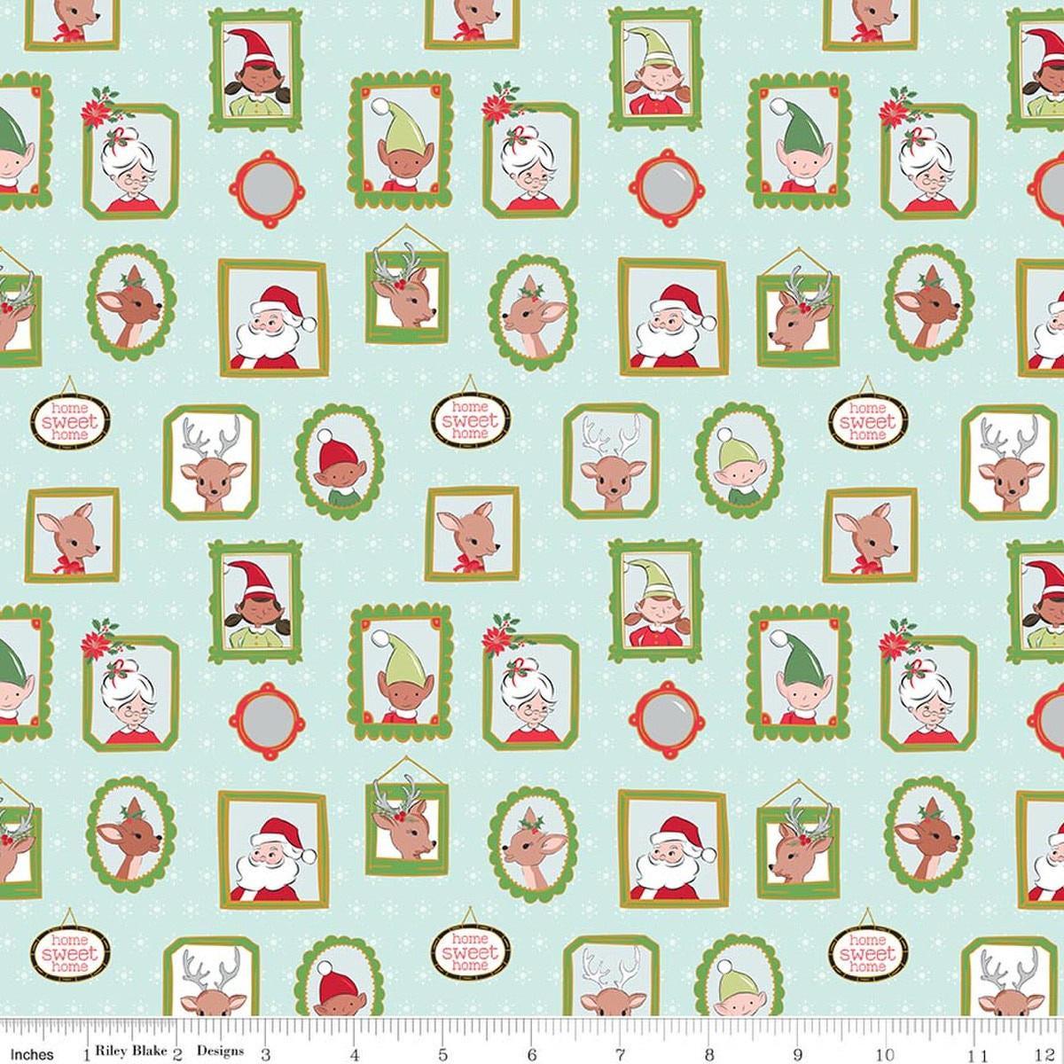 Image of Claus & Co. Wallpaper Blue Sparkle quilting cotton fabric by Melissa Mortenson for Riley Blake Designs. Features pictures on a blue background. Cute Little Fabric Shop.