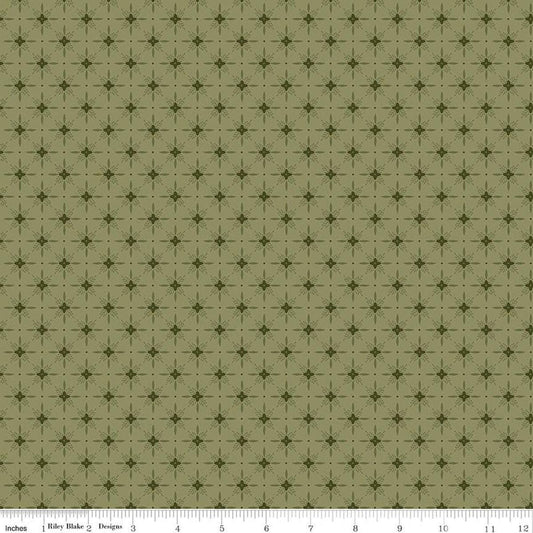 Image of Christmas Greetings Twinkle Spruce quilting cotton fabric by Sandy Gervais for Riley Blake Designs. Features a geometric pattern on a green background. Cute Little Fabric Shop.