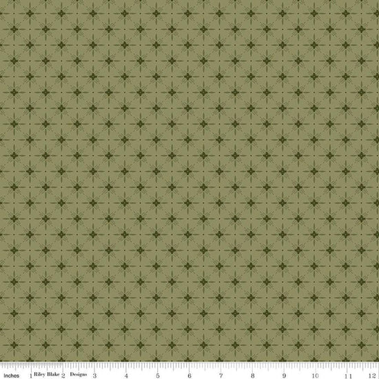 Image of Christmas Greetings Twinkle Spruce quilting cotton fabric by Sandy Gervais for Riley Blake Designs. Features a geometric pattern on a green background. Cute Little Fabric Shop.