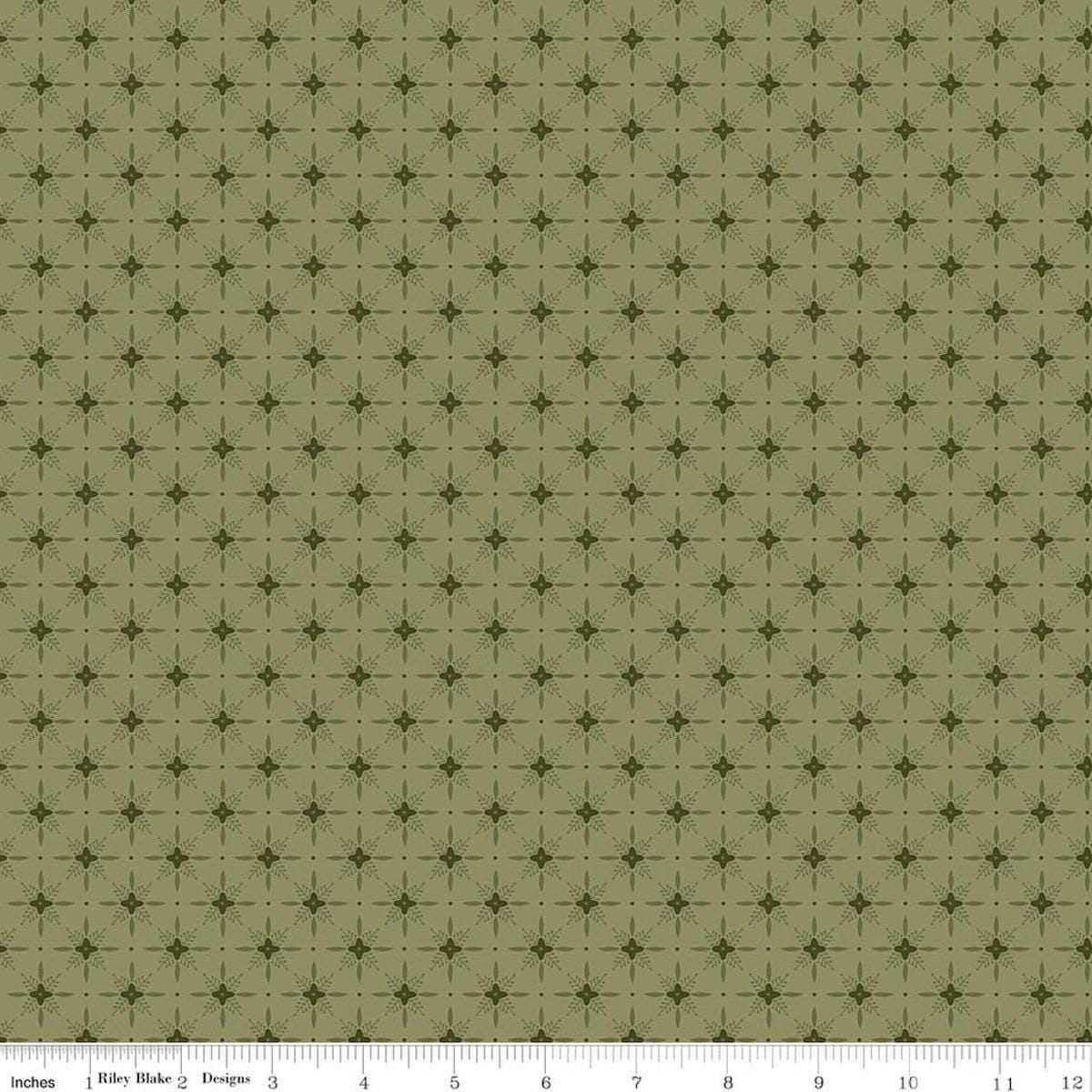 Image of Christmas Greetings Twinkle Spruce quilting cotton fabric by Sandy Gervais for Riley Blake Designs. Features a geometric pattern on a green background. Cute Little Fabric Shop.