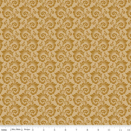 Image of Christmas Greetings Scroll Gold quilting cotton fabric by Sandy Gervais for Riley Blake Designs. Features swirls on a yellow background. Cute Little Fabric Shop.