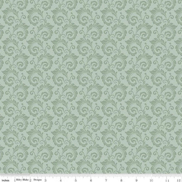 Image of Christmas Greetings Scroll Sage quilting cotton fabric by Sandy Gervais for Riley Blake Designs. Features swirls on a green background. Cute Little Fabric Shop.