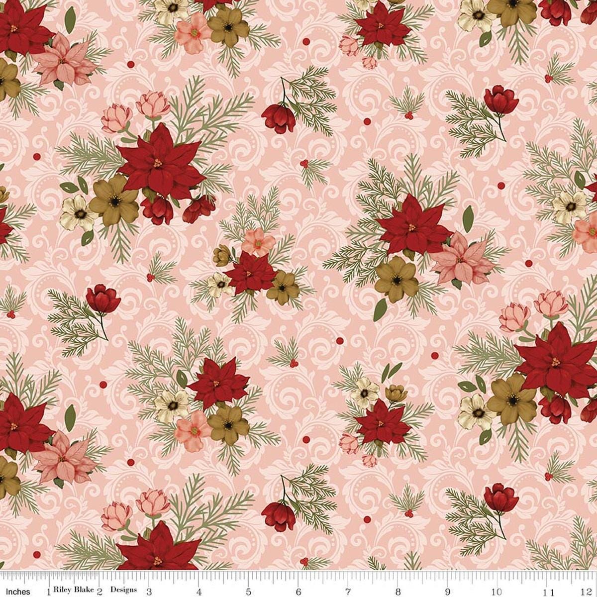 Image of Christmas Greetings Floral Pink quilting cotton fabric by Sandy Gervais for Riley Blake Designs. Features flowers on a pink background. Cute Little Fabric Shop.