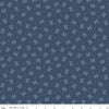 Image of Rosewood Petticoat Oxford quilting cotton fabric by Jessica Chertkow for Riley Blake Designs. Features bows on a blue background. Cute Little Fabric Shop.