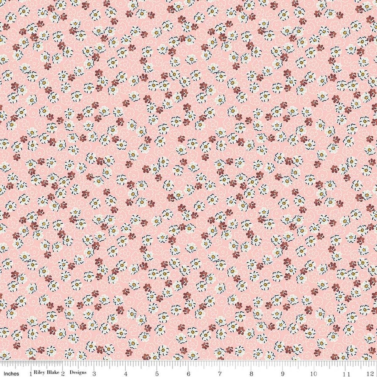 Image of Rosewood Wren Pink quilting cotton fabric by Jessica Chertkow for Riley Blake Designs. Features flowers on a pink background. Cute Little Fabric Shop.