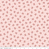 Image of Rosewood Petticoat Pink quilting cotton fabric by Jessica Chertkow for Riley Blake Designs. Features bows on a pink background. Cute Little Fabric Shop.