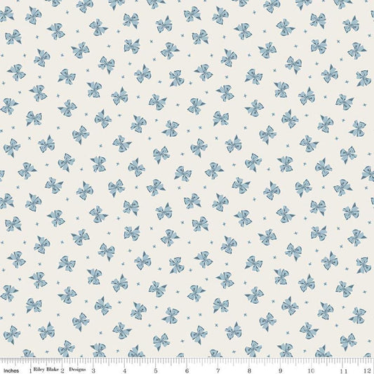 Image of Rosewood Petticoat Cream quilting cotton fabric by Jessica Chertkow for Riley Blake Designs. Features bows on a cream background. Cute Little Fabric Shop.