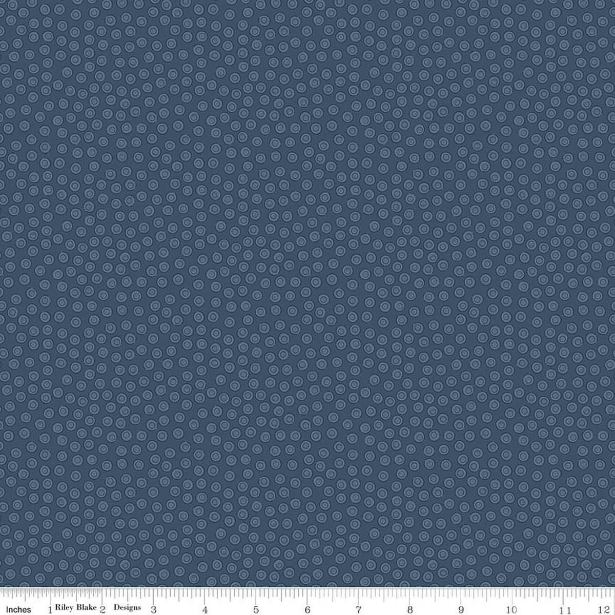 Image of Rosewood Cameo Oxford quilting cotton fabric by Jessica Chertkow for Riley Blake Designs. Features dots on a blue background. Cute Little Fabric Shop.