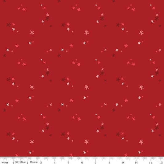 Image of Nutcracker Tradition Christmas Magic Berry quilting cotton fabric by Jennifer Long for Riley Blake Designs. Features stars on a red background. Cute Little Fabric Shop.