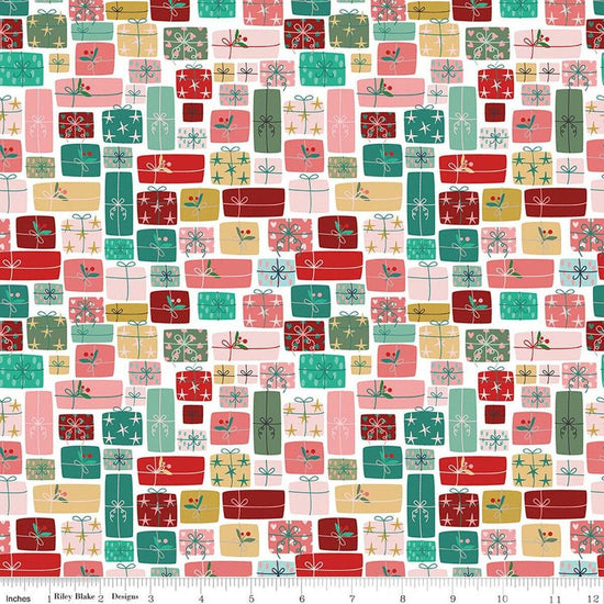 Image of Nutcracker Tradition Gifts of Giving Multi quilting cotton fabric by Jennifer Long for Riley Blake Designs. Features presents on a pink and blue background. Cute Little Fabric Shop.