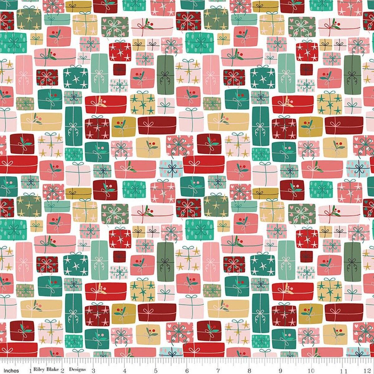 Image of Nutcracker Tradition Gifts of Giving Multi quilting cotton fabric by Jennifer Long for Riley Blake Designs. Features presents on a pink and blue background. Cute Little Fabric Shop.