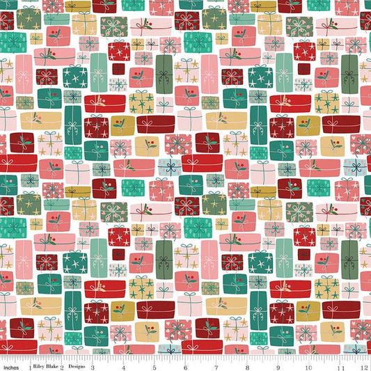 Image of Nutcracker Tradition Gifts of Giving Multi quilting cotton fabric by Jennifer Long for Riley Blake Designs. Features presents on a pink and blue background. Cute Little Fabric Shop.