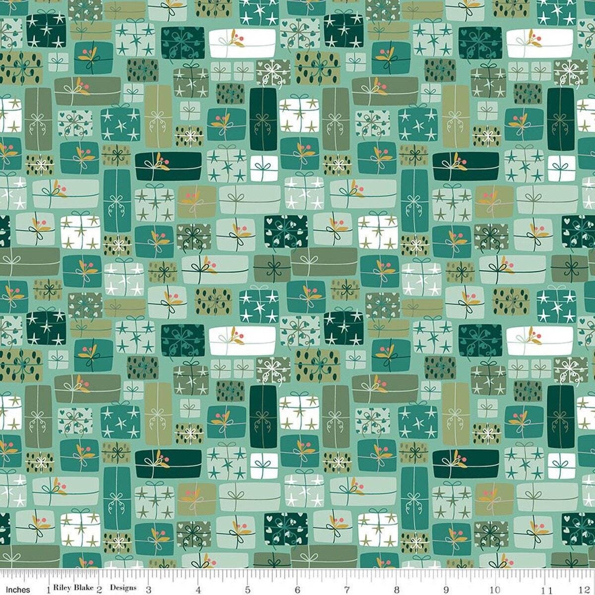 Image of Nutcracker Tradition Gifts of Giving Spearmint quilting cotton fabric by Jennifer Long for Riley Blake Designs. Features presents on a green background. Cute Little Fabric Shop.