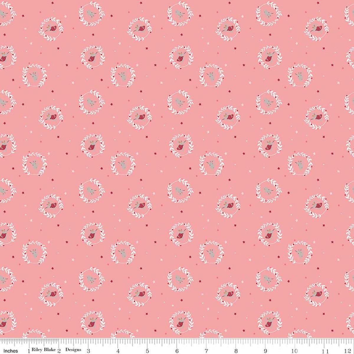 Image of Nutcracker Tradition Christmas Magic Sugar quilting cotton fabric by Jennifer Long for Riley Blake Designs. Features tiny dots and stars on a pink background. Cute Little Fabric Shop.