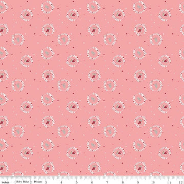 Image of Nutcracker Tradition Christmas Magic Sugar quilting cotton fabric by Jennifer Long for Riley Blake Designs. Features tiny dots and stars on a pink background. Cute Little Fabric Shop.