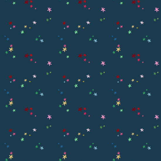 Image of Nutcracker Tradition Christmas Magic Midnight quilting cotton fabric by Jennifer Long for Riley Blake Designs. Features stars on a blue background. Cute Little Fabric Shop.