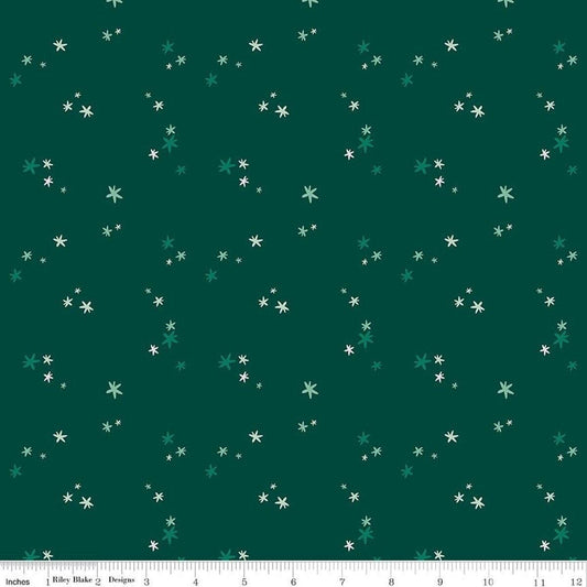 Image of Nutcracker Tradition Christmas Magic Pine quilting cotton fabric by Jennifer Long for Riley Blake Designs. Features stars on a green background. Cute Little Fabric Shop.
