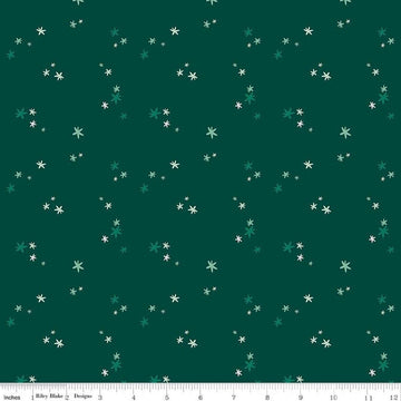 Image of Nutcracker Tradition Christmas Magic Pine quilting cotton fabric by Jennifer Long for Riley Blake Designs. Features stars on a green background. Cute Little Fabric Shop.