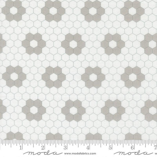 Image of A Cat Named Stitch Hexagons Cream Grey quilting cotton fabric by Camille Roskelley for Riley Blake Designs. Features hexagons on a cream background. Cute Little Fabric Shop.