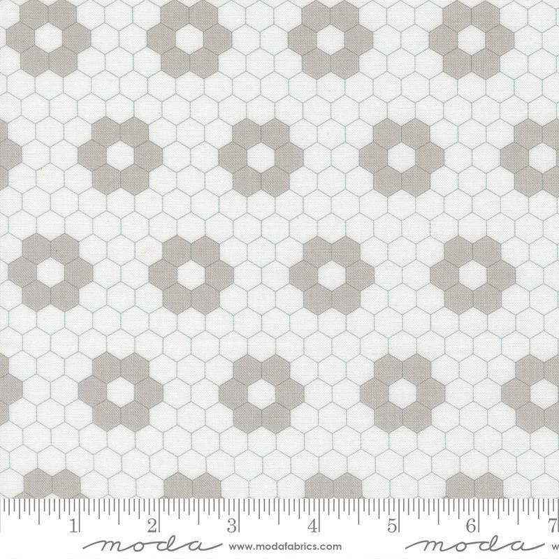 Image of A Cat Named Stitch Hexagons Cream Grey quilting cotton fabric by Camille Roskelley for Riley Blake Designs. Features hexagons on a cream background. Cute Little Fabric Shop.