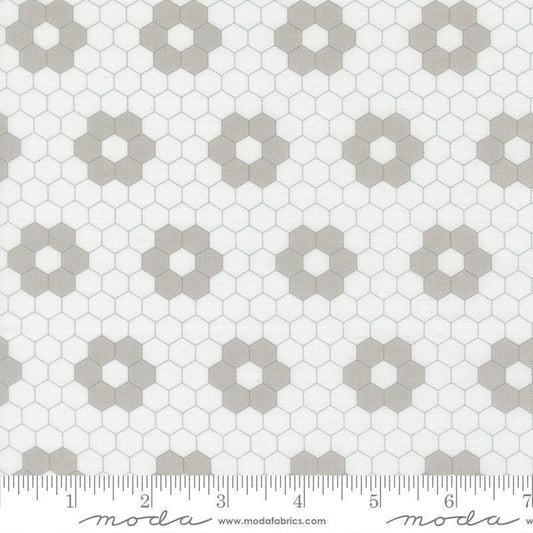 Image of A Cat Named Stitch Hexagons Cream Grey quilting cotton fabric by Camille Roskelley for Riley Blake Designs. Features hexagons on a cream background. Cute Little Fabric Shop.