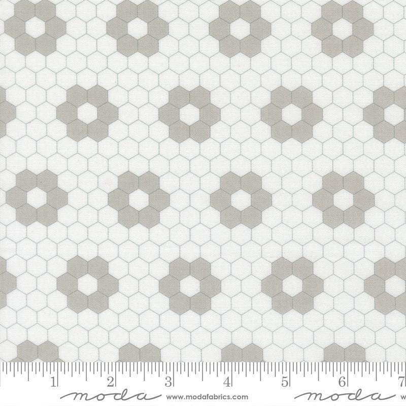 Image of A Cat Named Stitch Hexagons Cream Grey quilting cotton fabric by Camille Roskelley for Riley Blake Designs. Features hexagons on a cream background. Cute Little Fabric Shop.