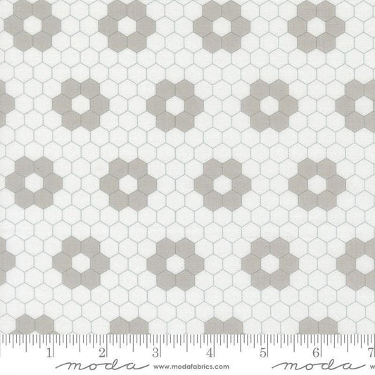 Image of A Cat Named Stitch Hexagons Cream Grey quilting cotton fabric by Camille Roskelley for Riley Blake Designs. Features hexagons on a cream background. Cute Little Fabric Shop.