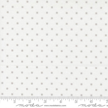 Image of A Cat Named Stitch Cosmo Cream Grey quilting cotton fabric by Camille Roskelley for Riley Blake Designs. Features polka dot squares on a cream background. Cute Little Fabric Shop.