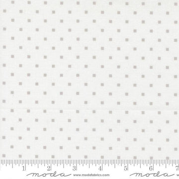 Image of A Cat Named Stitch Cosmo Cream Grey quilting cotton fabric by Camille Roskelley for Riley Blake Designs. Features polka dot squares on a cream background. Cute Little Fabric Shop.