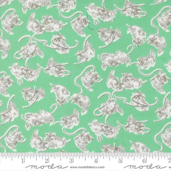 Image of A Cat Named Stitch Kitten Green quilting cotton fabric by Camille Roskelley for Riley Blake Designs. Features cats on a green background. Cute Little Fabric Shop.