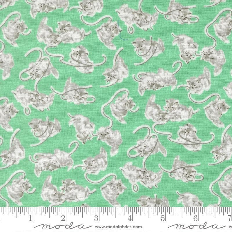 Image of A Cat Named Stitch Kitten Green quilting cotton fabric by Camille Roskelley for Riley Blake Designs. Features cats on a green background. Cute Little Fabric Shop.