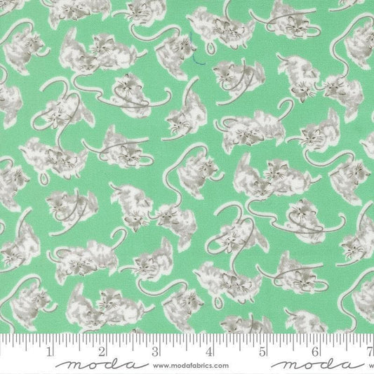 Image of A Cat Named Stitch Kitten Green quilting cotton fabric by Camille Roskelley for Riley Blake Designs. Features cats on a green background. Cute Little Fabric Shop.