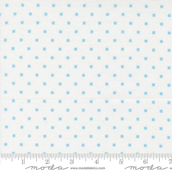 Image of A Cat Named Stitch Cosmo Cream Sky quilting cotton fabric by Camille Roskelley for Riley Blake Designs. Features polka dot squares on a cream background. Cute Little Fabric Shop.
