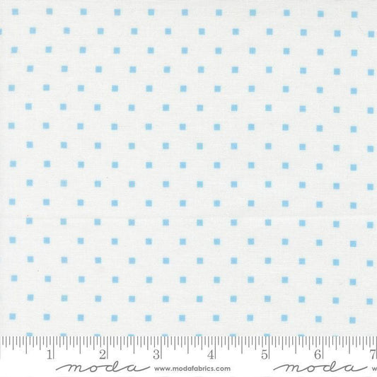 Image of A Cat Named Stitch Cosmo Cream Sky quilting cotton fabric by Camille Roskelley for Riley Blake Designs. Features polka dot squares on a cream background. Cute Little Fabric Shop.