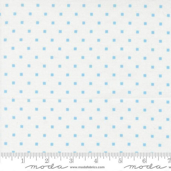 Image of A Cat Named Stitch Cosmo Cream Sky quilting cotton fabric by Camille Roskelley for Riley Blake Designs. Features polka dot squares on a cream background. Cute Little Fabric Shop.