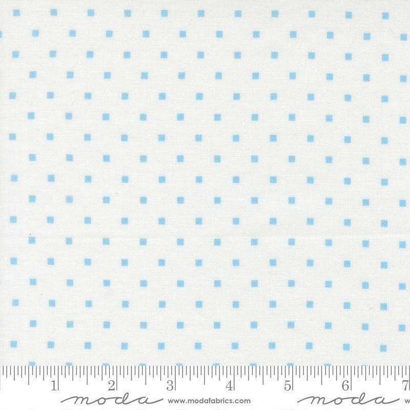 Image of A Cat Named Stitch Cosmo Cream Sky quilting cotton fabric by Camille Roskelley for Riley Blake Designs. Features polka dot squares on a cream background. Cute Little Fabric Shop.
