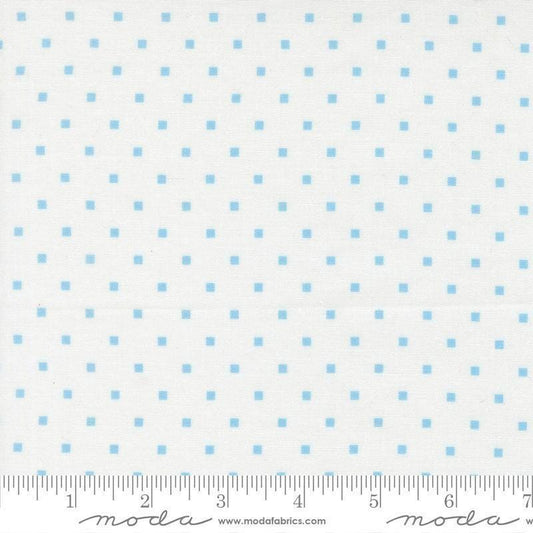 Image of A Cat Named Stitch Cosmo Cream Sky quilting cotton fabric by Camille Roskelley for Riley Blake Designs. Features polka dot squares on a cream background. Cute Little Fabric Shop.