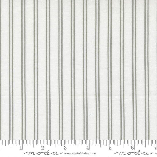 Image of A Cat Named Stitch Stripes Cream Grey quilting cotton fabric by Camille Roskelley for Riley Blake Designs. Features stripes on a cream background. Cute Little Fabric Shop.