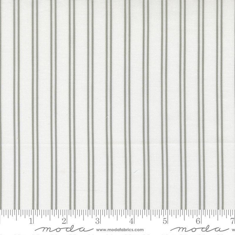Image of A Cat Named Stitch Stripes Cream Grey quilting cotton fabric by Camille Roskelley for Riley Blake Designs. Features stripes on a cream background. Cute Little Fabric Shop.