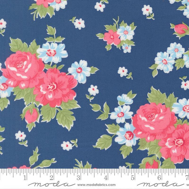 Image of A Cat Named Stitch Blooming Florals Sea quilting cotton fabric by Camille Roskelley for Riley Blake Designs. Features flowers on a blue background. Cute Little Fabric Shop.