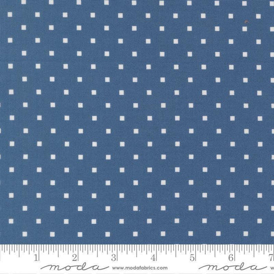 Image of A Cat Named Stitch Cosmo Sea quilting cotton fabric by Camille Roskelley for Riley Blake Designs. Features polka dot squares on a blue background. Cute Little Fabric Shop.
