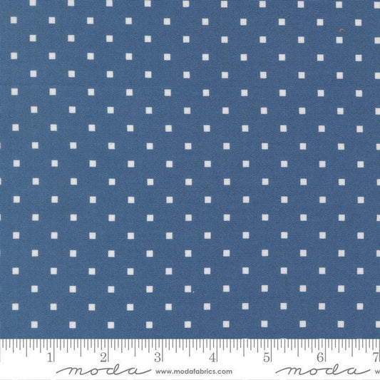 Image of A Cat Named Stitch Cosmo Sea quilting cotton fabric by Camille Roskelley for Riley Blake Designs. Features polka dot squares on a blue background. Cute Little Fabric Shop.
