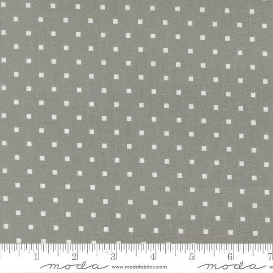 Image of A Cat Named Stitch Cosmo Tabby quilting cotton fabric by Camille Roskelley for Riley Blake Designs. Features polka dot squares on a gray background. Cute Little Fabric Shop.