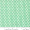 Image of A Cat Named Stitch June Green quilting cotton fabric by Camille Roskelley for Riley Blake Designs. Features flowers on a green background. Cute Little Fabric Shop.