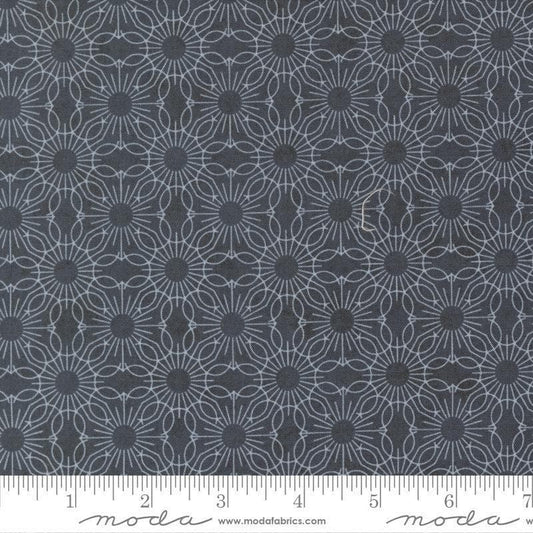 Image of Fieldrush Jasmine Portobello quilting cotton fabric by Basic Grey for Moda Fabrics. Features flowers on a blue background. Cute Little Fabric Shop.