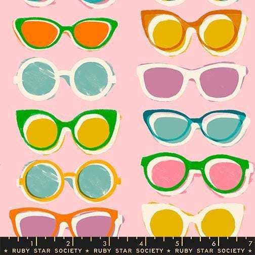 Image of Poolside Too Shades Cotton Candy quilting cotton fabric by Ruby Star Society for Moda Fabrics. Features sunglasses on a pink background. Cute Little Fabric Shop.