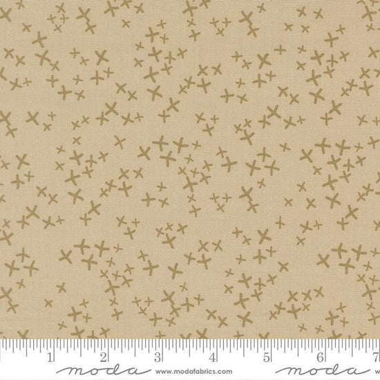 Image of Mira Realm Tan quilting cotton fabric by Zen Chic for Moda Fabrics. Features crosses on a brown background. Cute Little Fabric Shop.